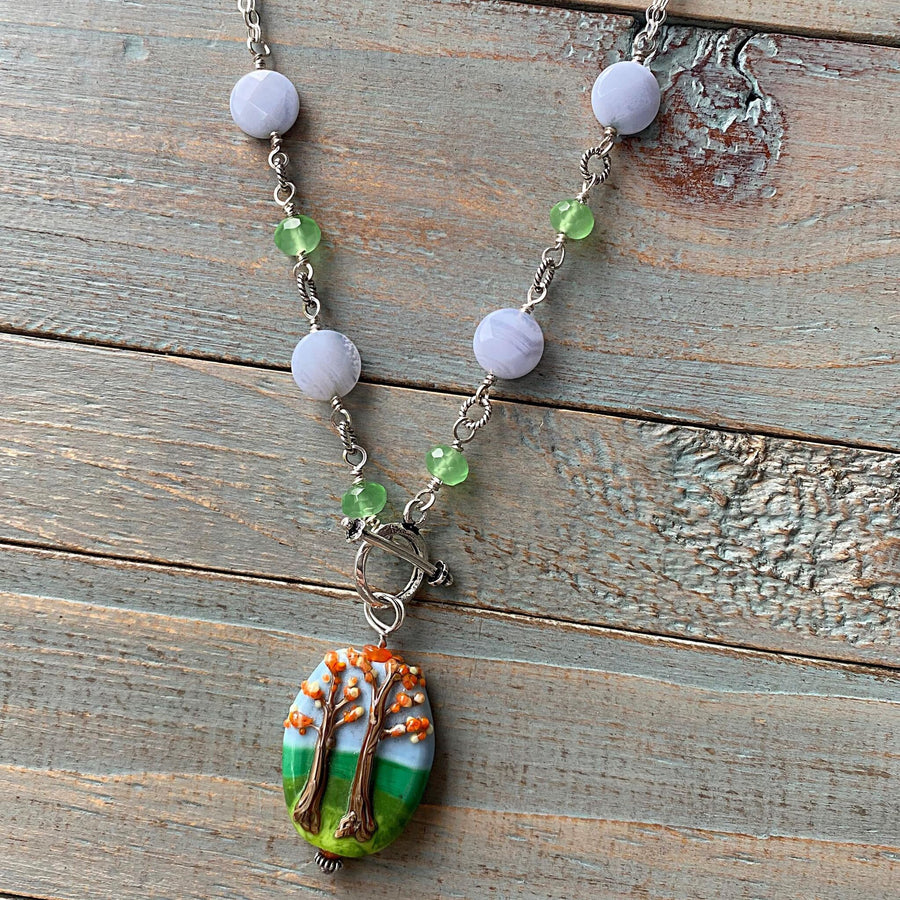 Stunning Artisan Sterling Silver and Fall Trees Scene Lampwork Glass necklace with Blue Lace Agate and Green Quartz Accents, Front Toggle