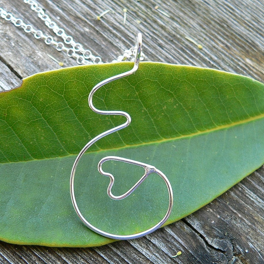 Unfurling Love...A pregnancy necklace. Hand Forged Sterling Silver Pendant