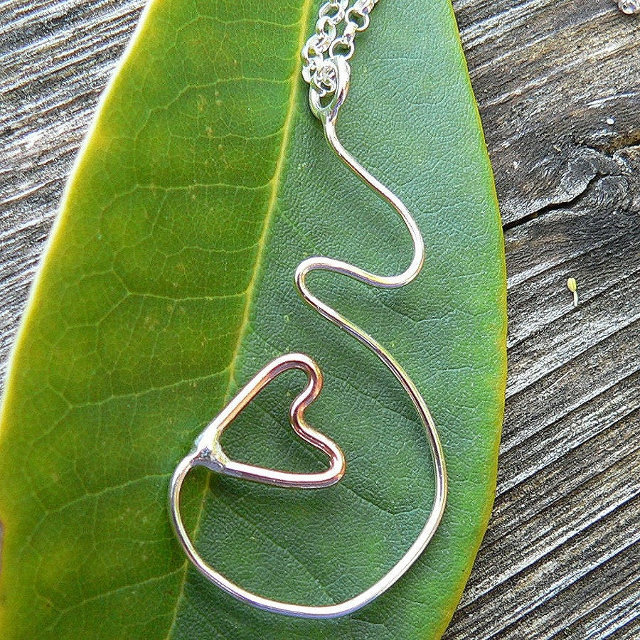 Unfurling Love...A pregnancy necklace. Hand Forged Sterling Silver Pendant